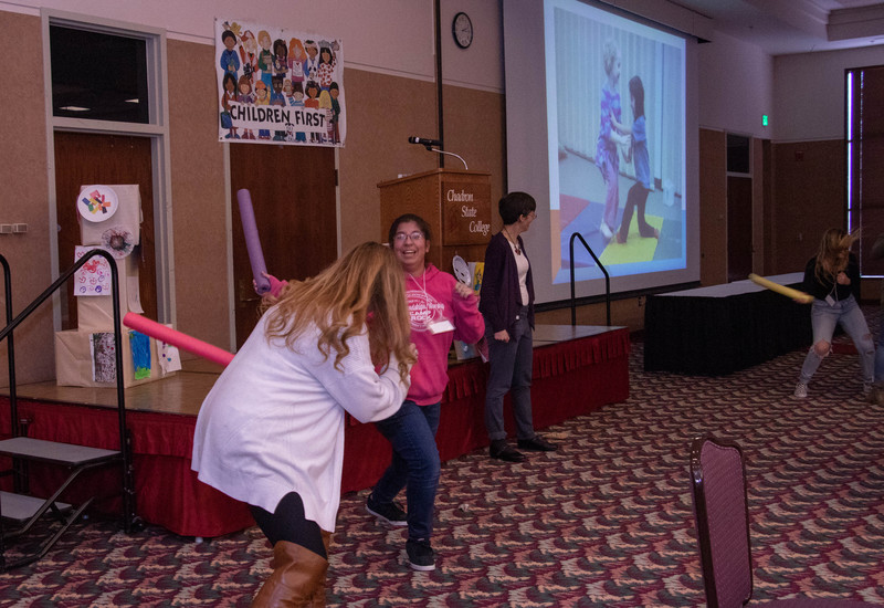 Becky Jo Wylie, left, and Mirka Anguiano, both of Scottsbluff, take part in an exercise demonstrating a healthy way for pre-school children to express their anger Saturday, Feb. 16, 2019, in the Student Center.