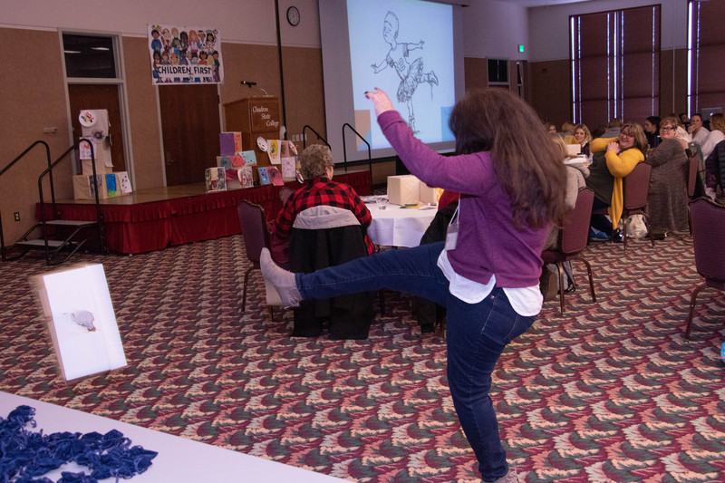 Isabelle Dehling of Chadron kicks and empty box as part of an exercise demonstrating ahealthy way for pre-school children to express their anger Saturday, Feb. 16, 2019, in the Student Center. (Tena L. Cook/Chadron State College)