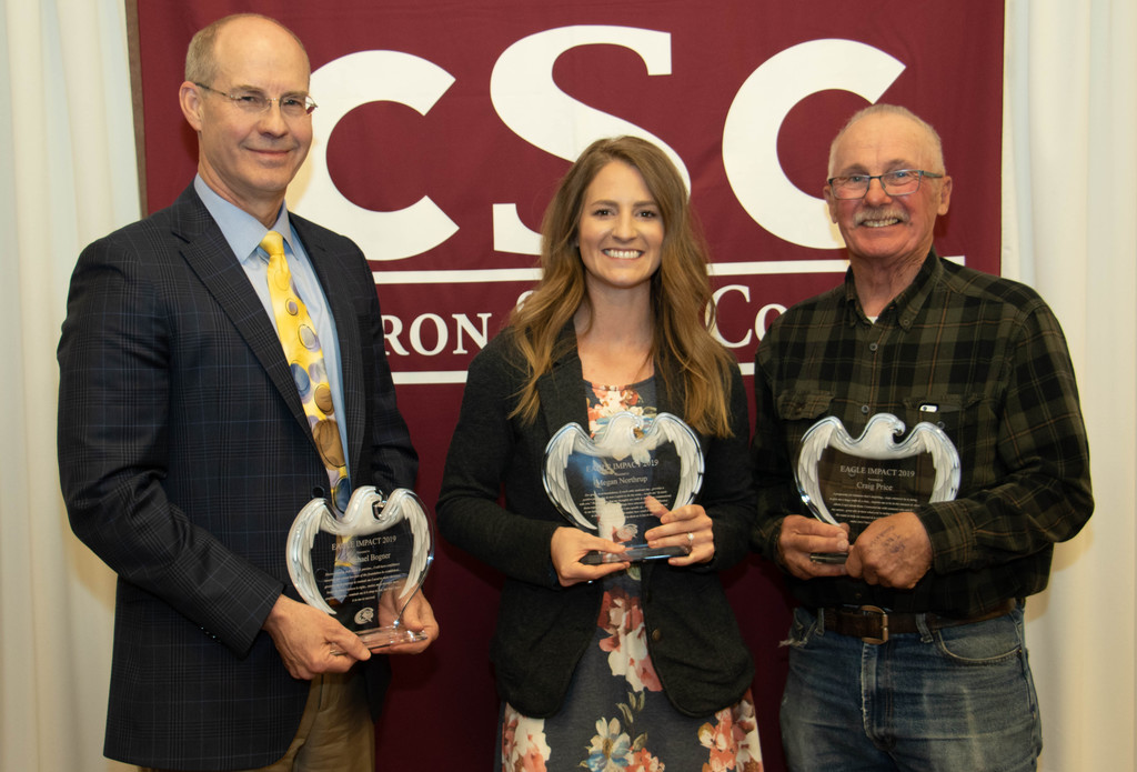 Eagle Impact award recipients, from left. Dr. Michael Bogner, faculty, Megan Northrup, professional staff, and Craig Price, support staff.