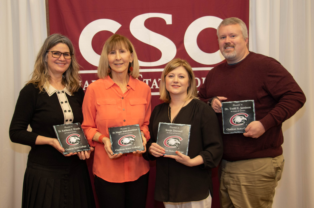 Chadron State College employees with 10 years of service pose at the annual CSC recognition luncheon April 30, 2019, in the CSC Student Center. From left, Kathleen Woods, Maggie Smith-Bruehlman, Sonja Dressel and Todd Jamison. Not pictured: Anita Hankin, Casey James, Susie Jensen, Don Keiper, Hank McCallum and Andrew Schmid.