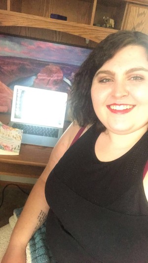 Chadron State College student April Wagner poses for a photo while studying.