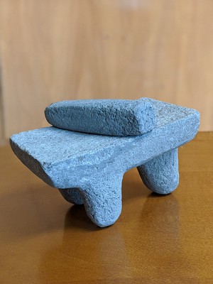 A replica of a metate and mono belonging to Dr. Tawny Tibbits.