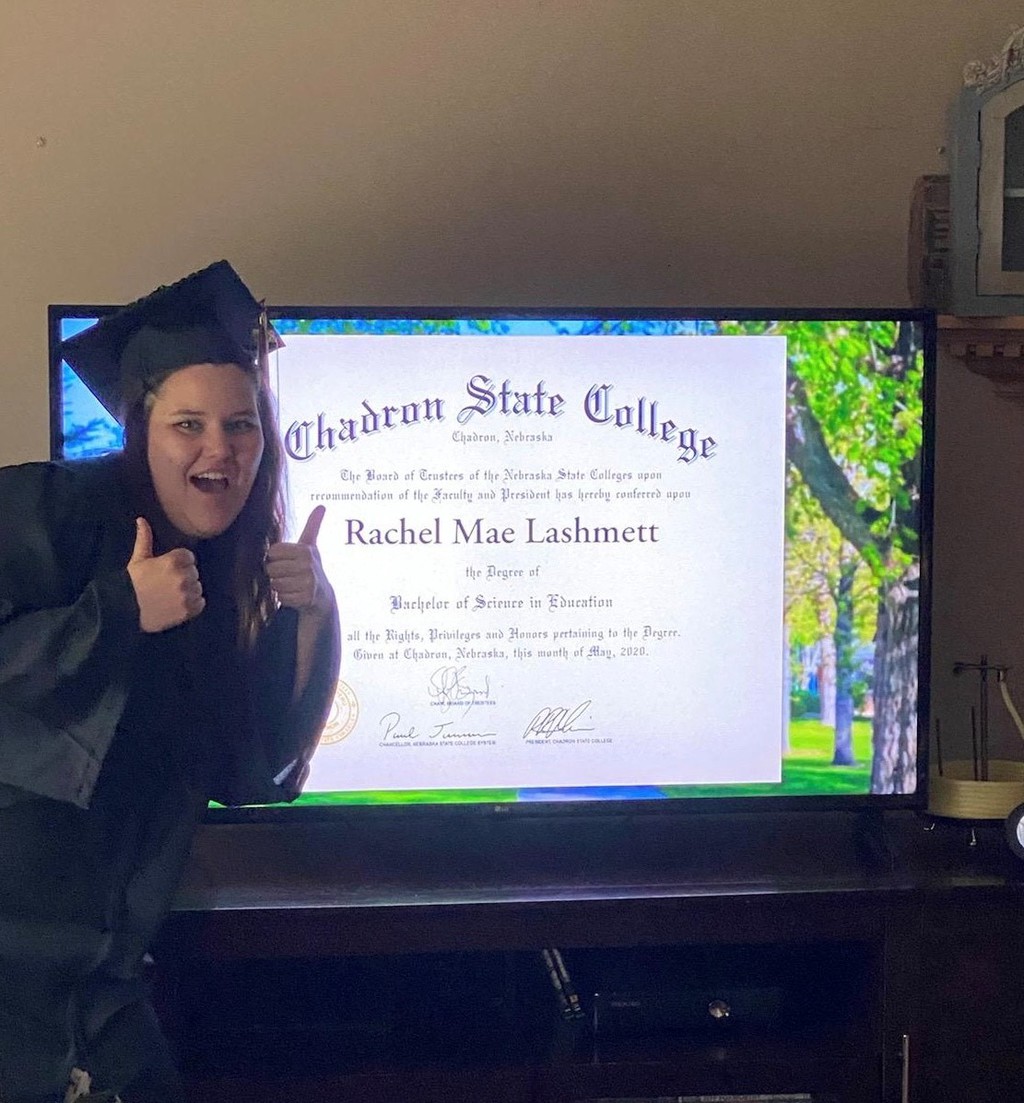 Rachel Lashmett poses with a screen shot of her diploma during CSC's first virtual commencement.