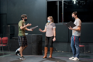 Cody Madrigal speaks to Bailey Bierle and Zak Wellnitz during a rehearsal for