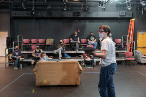 Jarret Buccholz speaks to Samuel LaRive during a rehearsal for 
