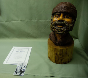 A play script and wood carving of Old Jules, Mari Sandoz's father