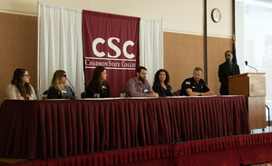 A panel discussion moderated by Dean of Professional Studies during Social Work 435 conference