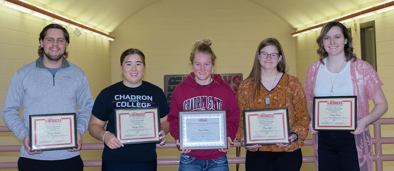 Five CSC students pose after winning the SHAPE award at the NPAC center