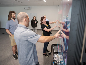 Four CSC faculty members use new technology put into the new math and science building.