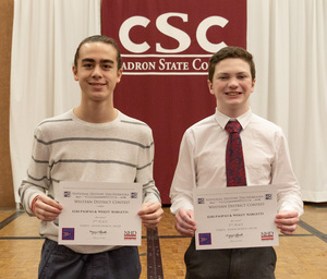 Two high school students pose with their awards as CSC hosts national history day.