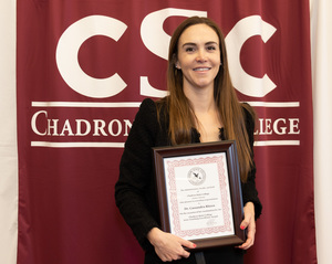 Cassandra Ritzen poses with award