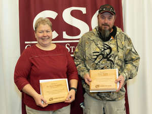 Dr. Dawn Brammer and Steve Weber pose with their awards.