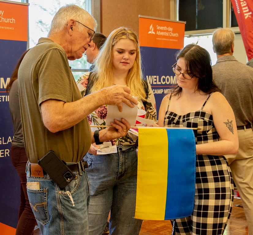 Community volunteer speaking to students
