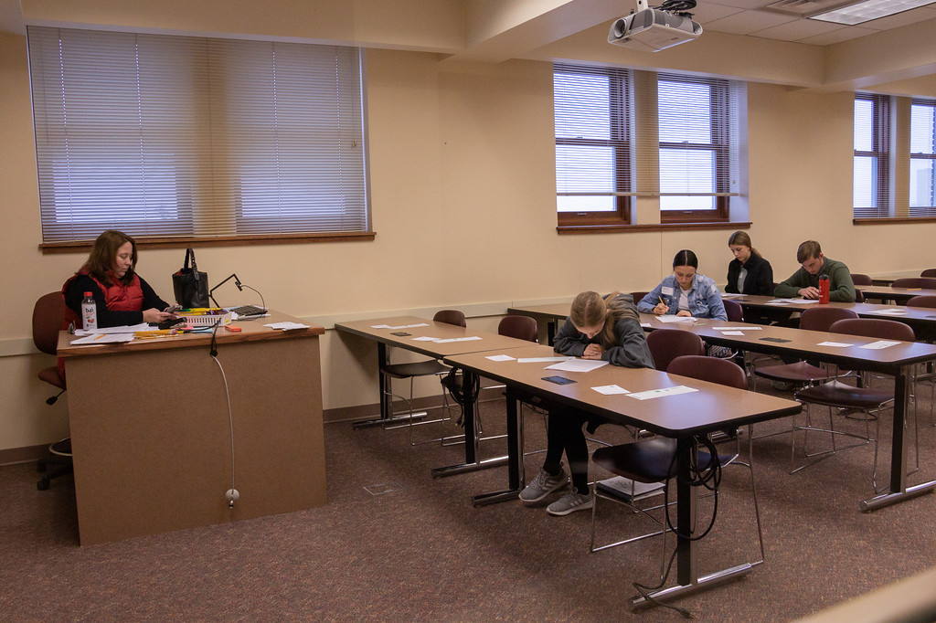 Teacher and studetns in a classroom