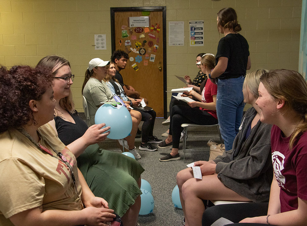 Students with a balloon