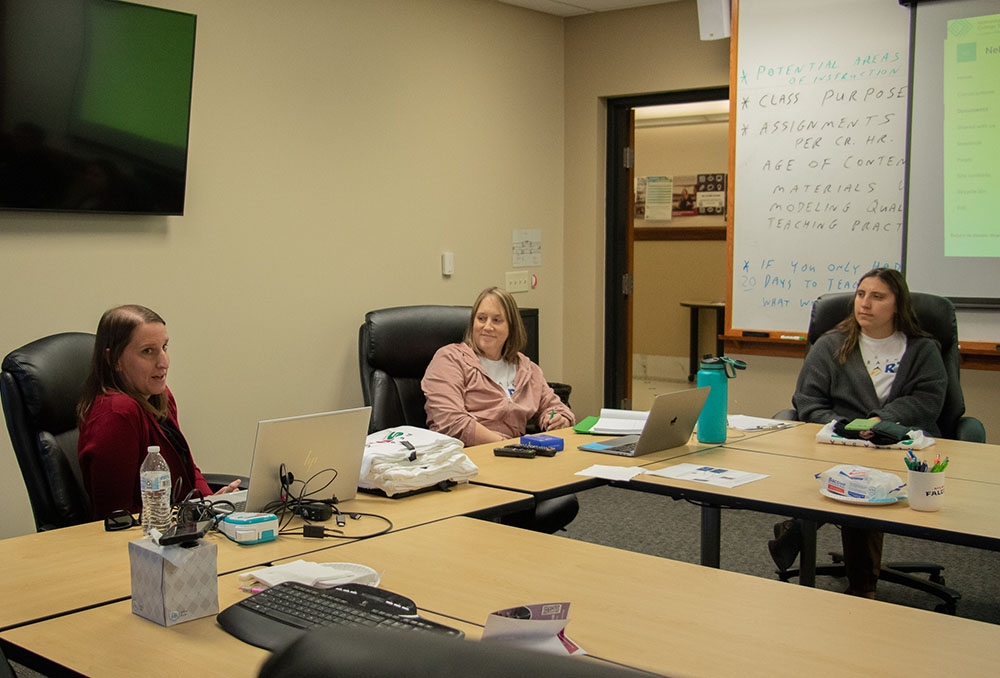 Adults in a classroom setting