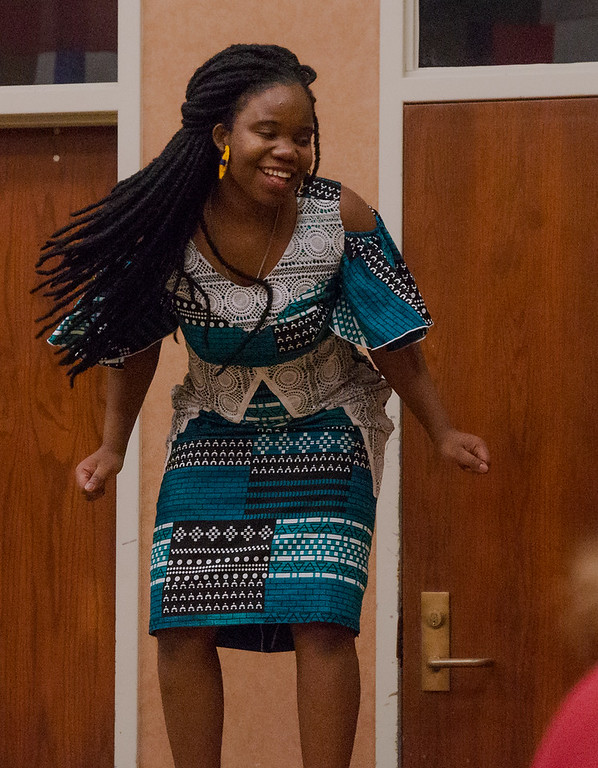 Woman dancing during International Dinner