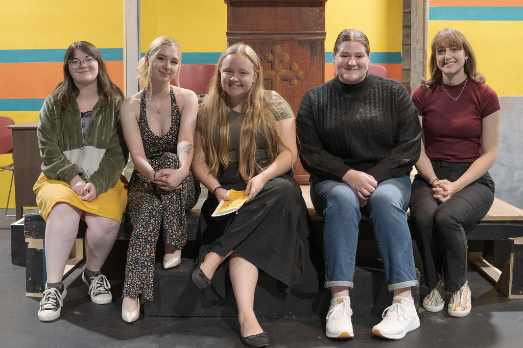 Actors posing on a stage