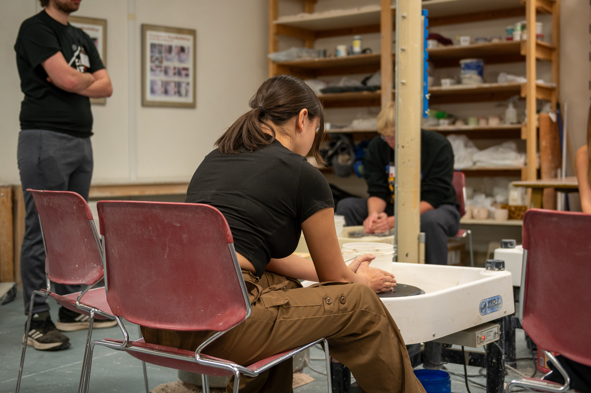 Area high school student works on pottery wheel during ceramics workshop at Art Day, Nov. 6, 2024. (Photo by Sydney Brown/Chadron State College)