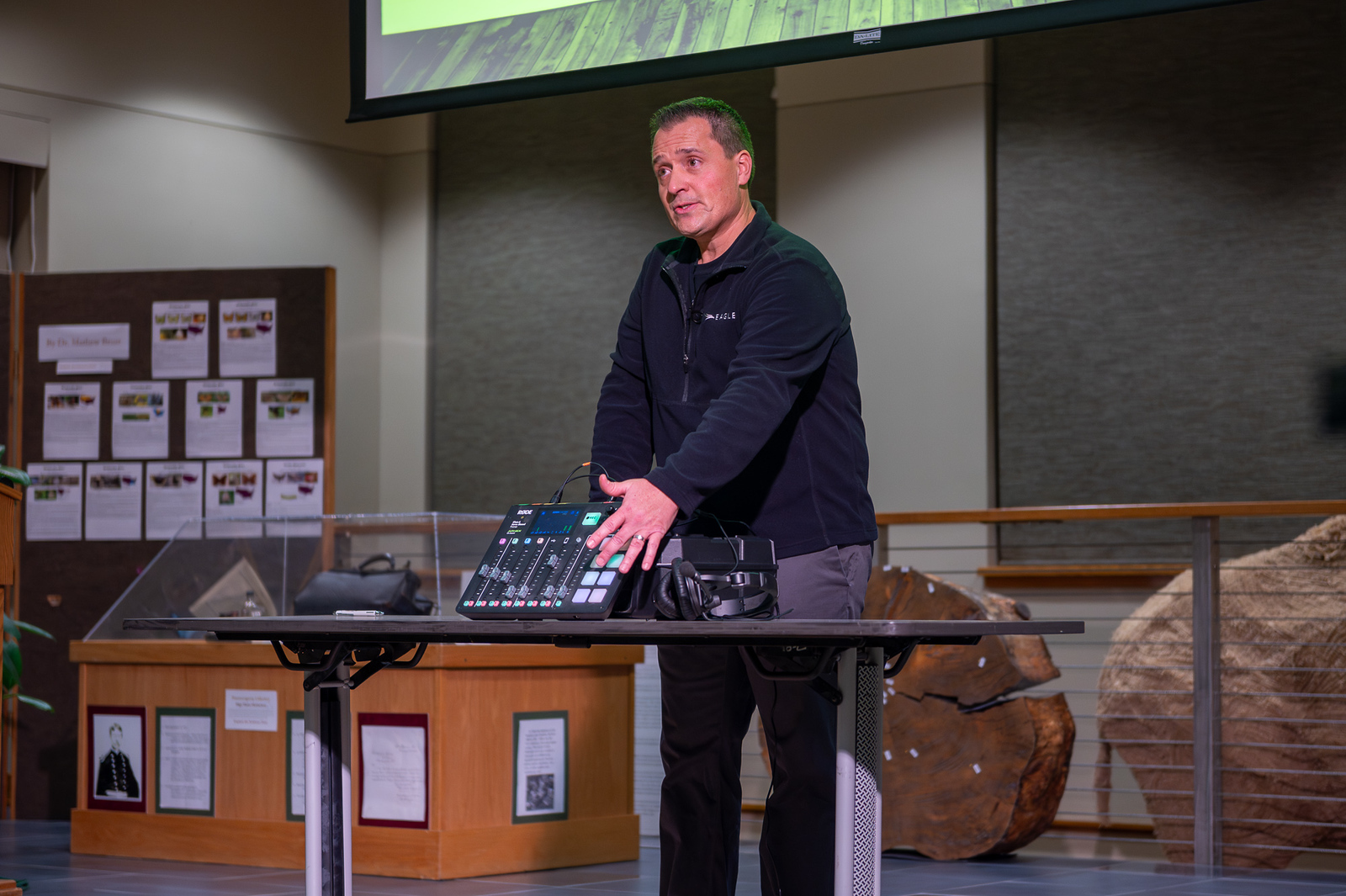 Male speaker presenting to an audience