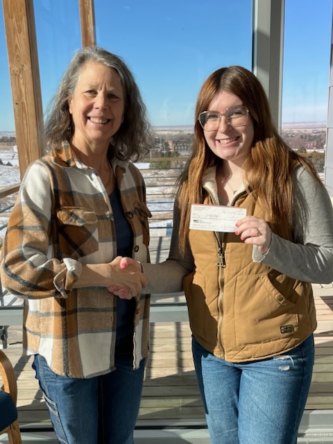 Student receiving a scholarship
