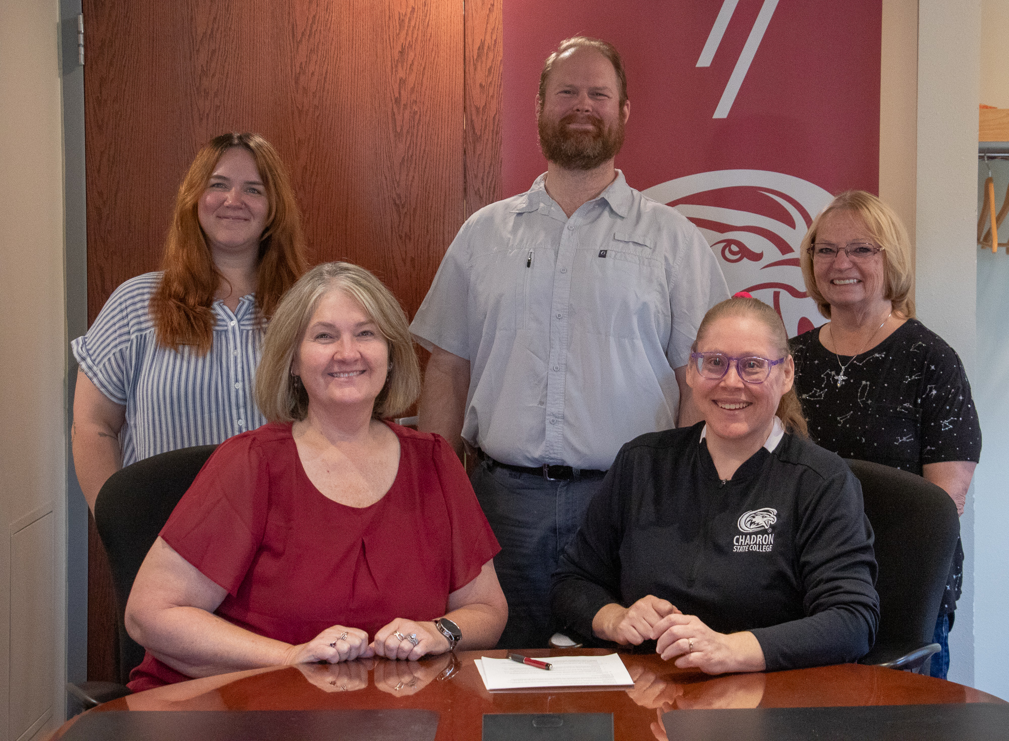 Staff Senate officers pose with president