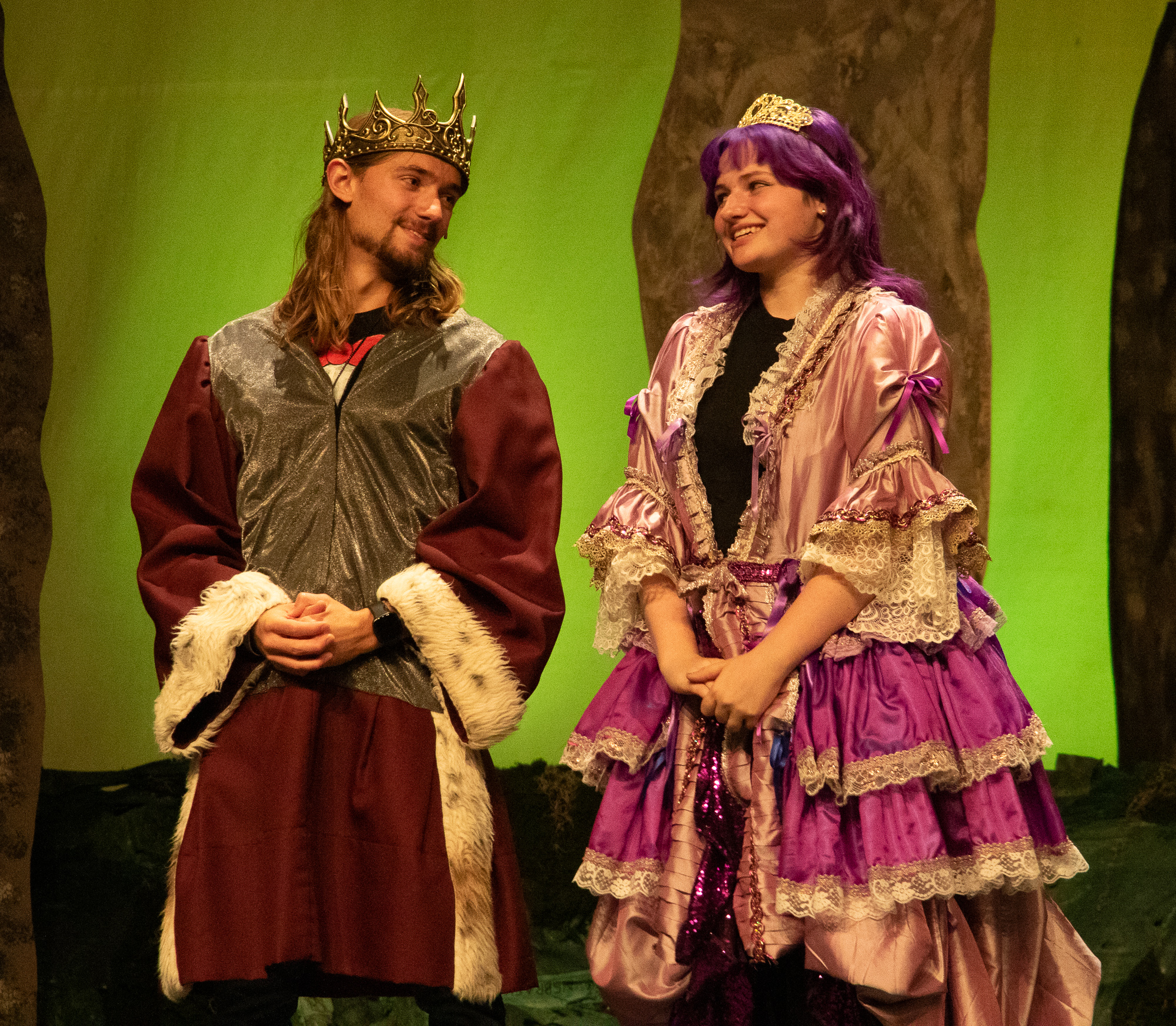 Actors portraying a king and queen