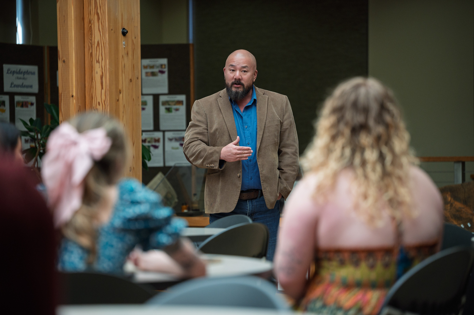 Professor speaking to a group