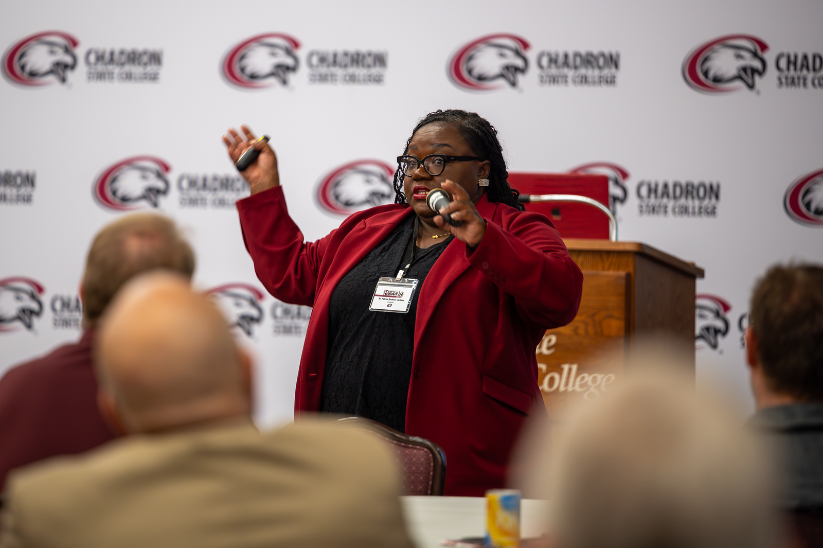 Woman presenting to a crowd