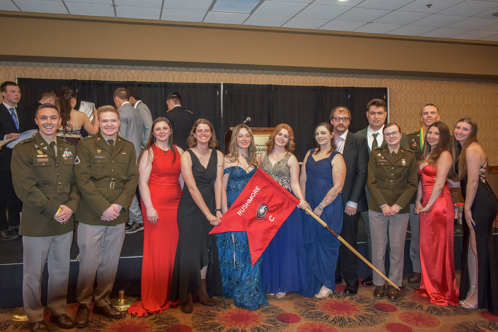 Military members and guests posing