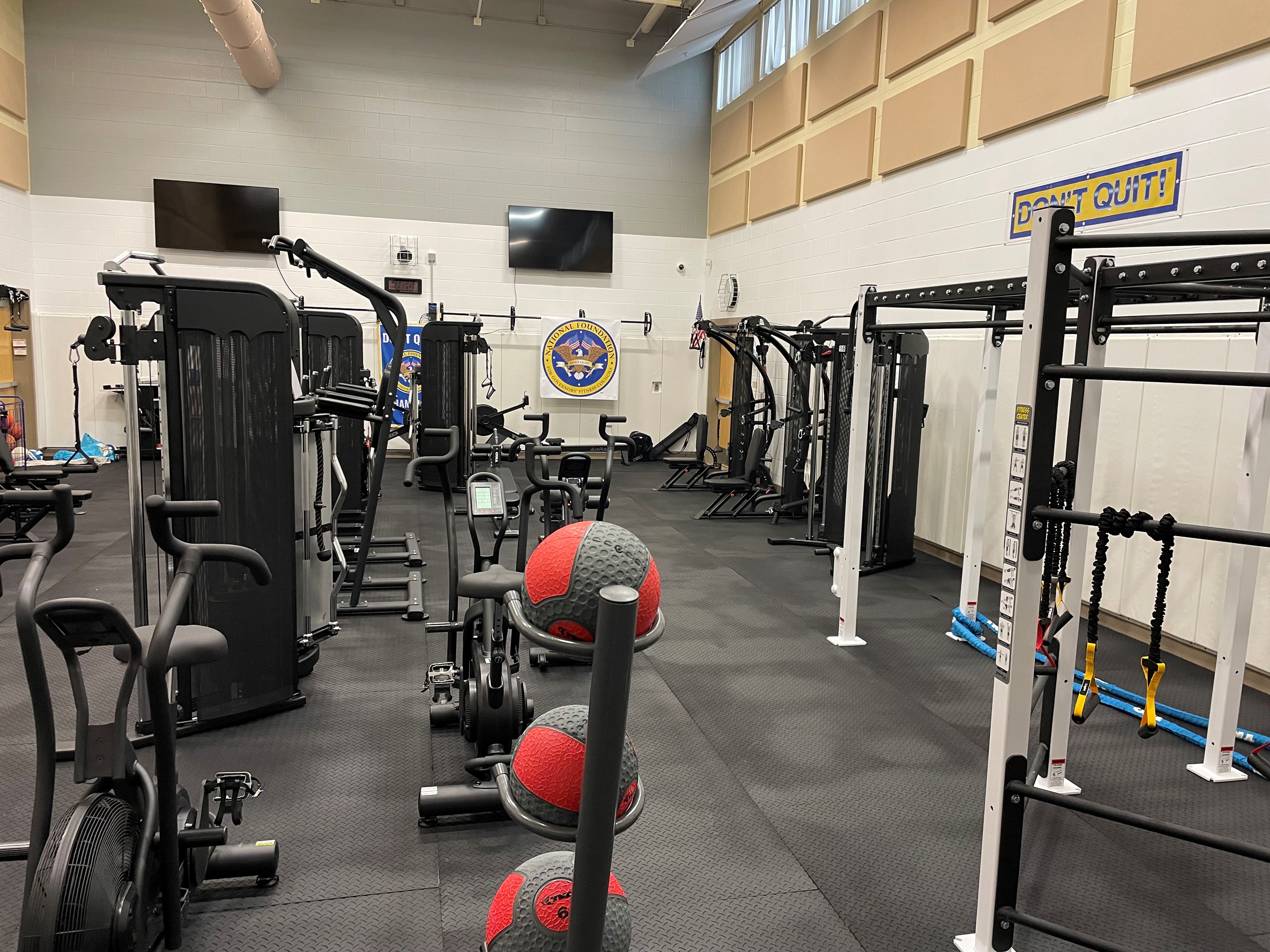A room filled with workout equipment