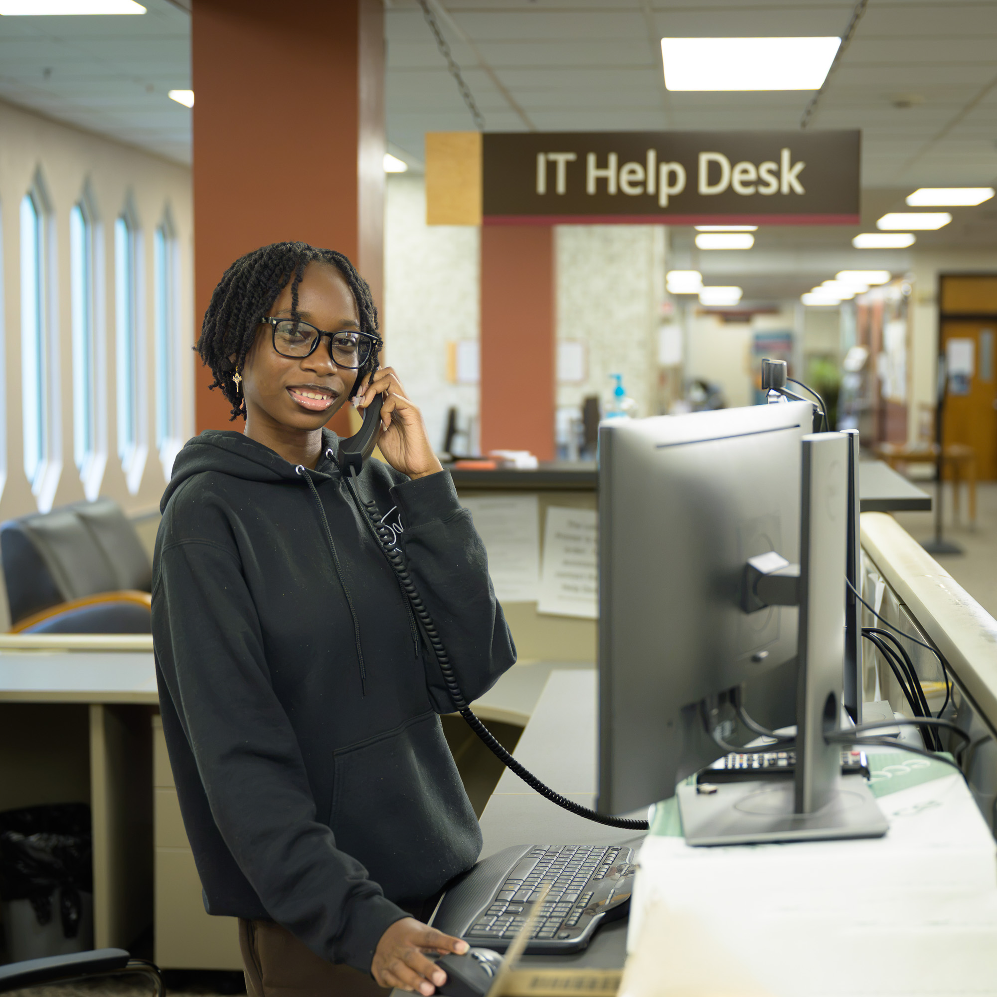 IT Help Desk Employee on the phone
