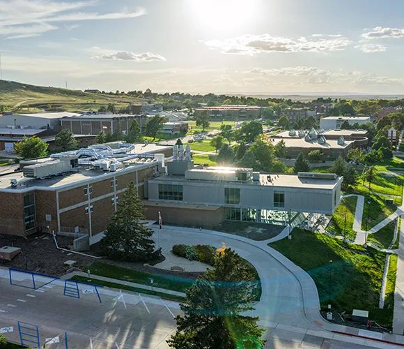 Overhead view of a college campus with modern science building in foreground