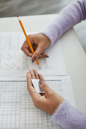 Student using a cheatsheet on an exam.